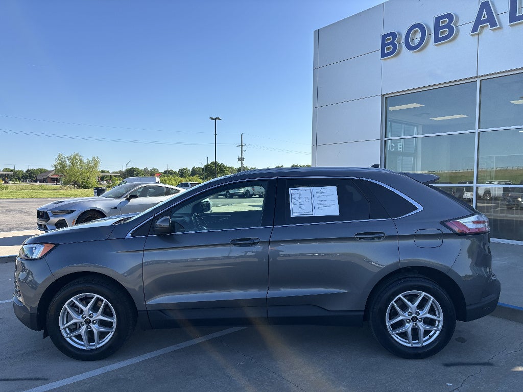 Used 2023 Ford Edge SEL with VIN 2FMPK4J97PBA14298 for sale in Kansas City